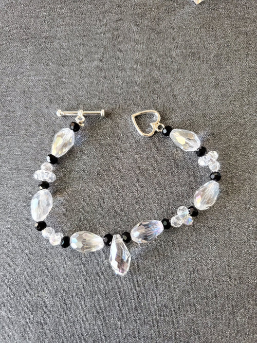 6in Elegant black and clear glass bead bracelet with single glass drop charm. - Arts & Scraps