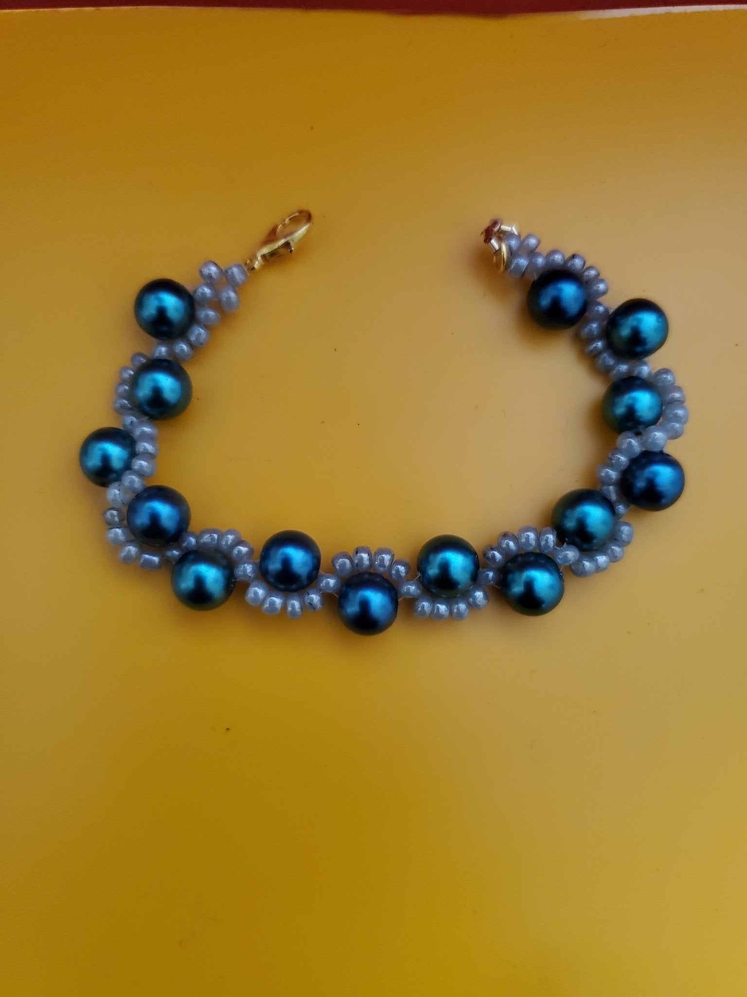 Beautiful beaded aqua blue and silver bracelet - Arts & Scraps