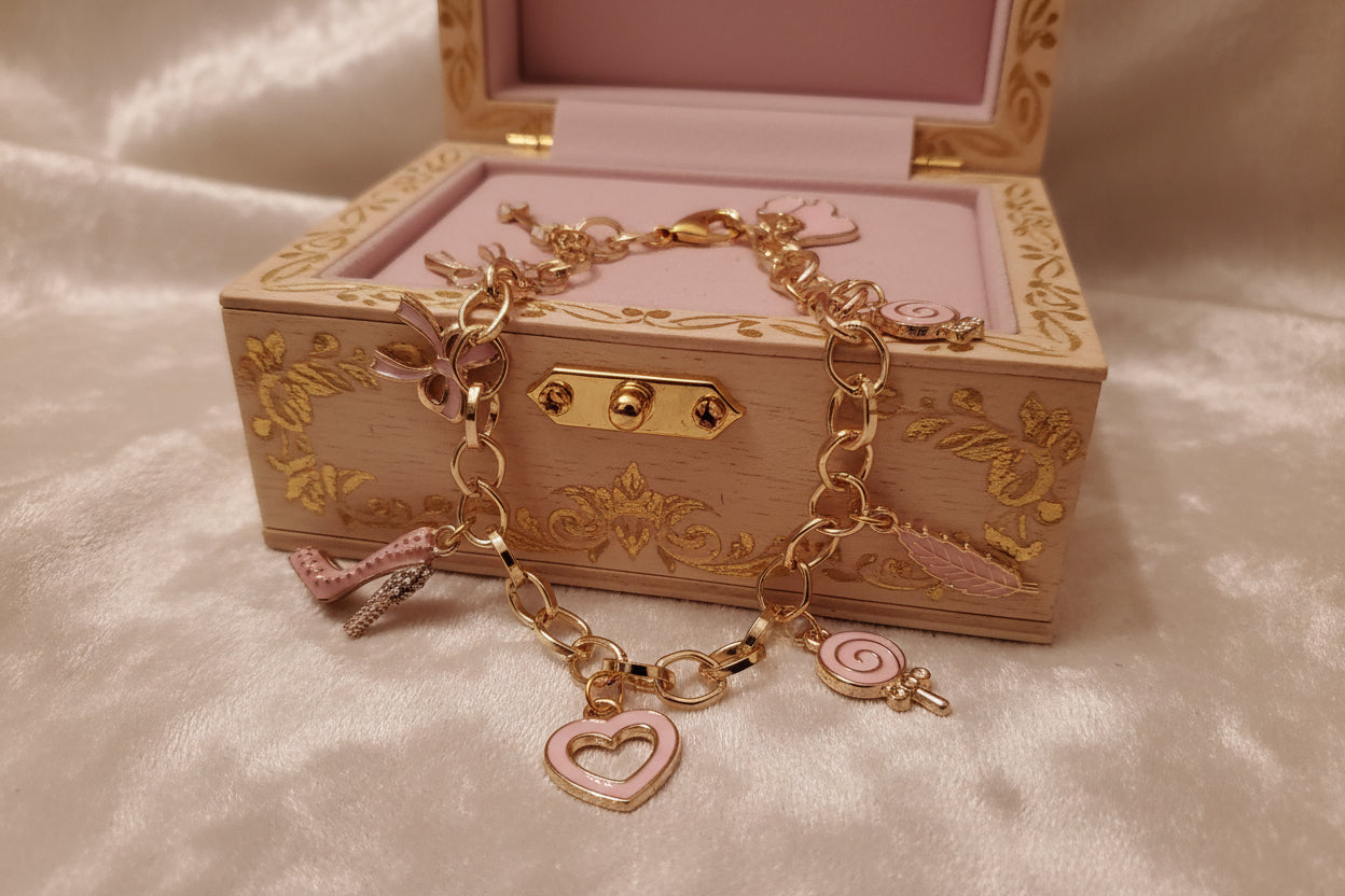 Pink lady charm bracelet - Arts & Scraps